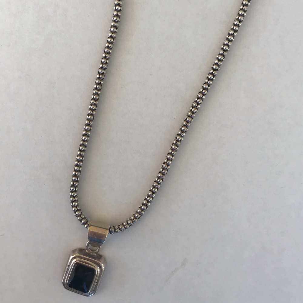 Silver necklace with black stone pendant